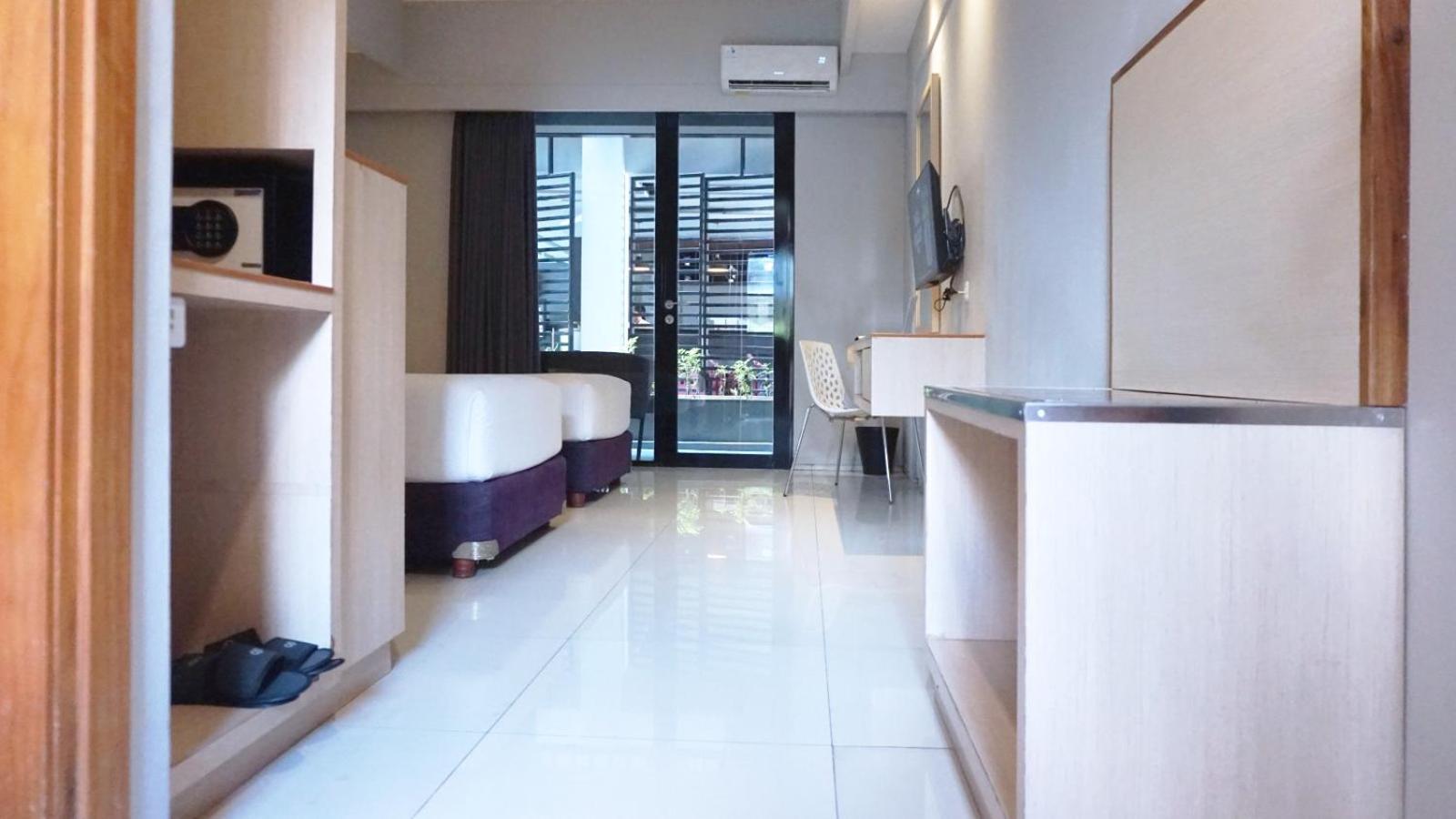 Conjioo Hotel Kuta Managed By Mhm Legian Buitenkant foto